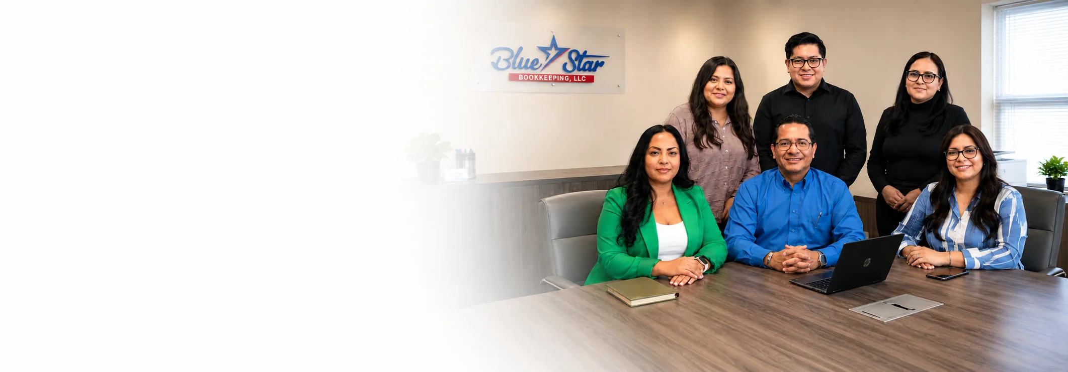 A Blue Star Bookkeeping tax professional at his desk in the Austin, TX office